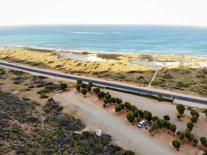 Aerial Shot Of Exmouth Road Near Body Of Water