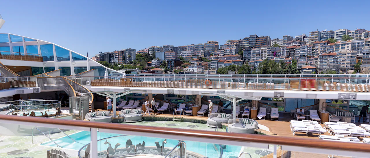 Oceania Vista’s Pool Deck reflects the beauty of the surrounding sea.