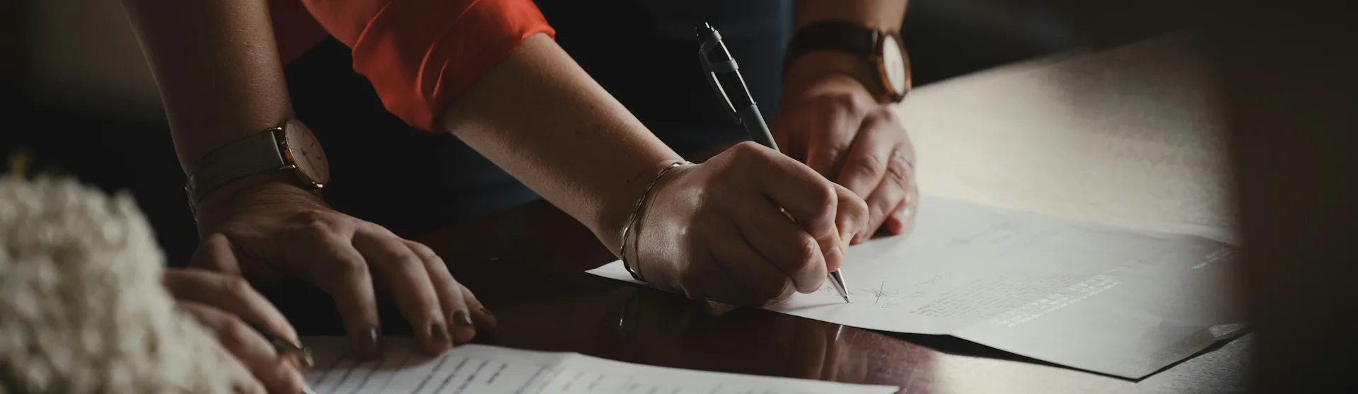 a man signing documents